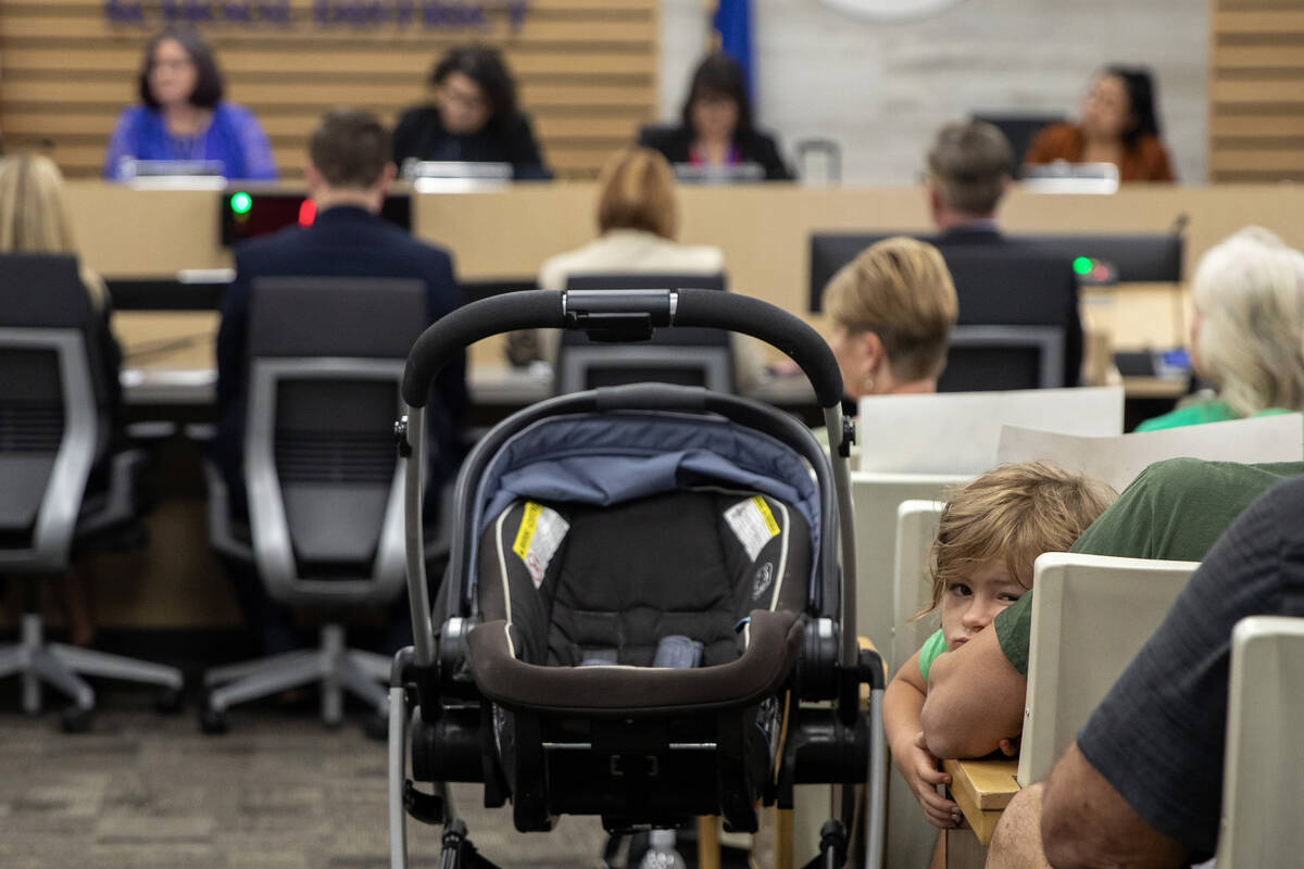 Daphne Thompson, 4, looks back during a Clark County School Board meeting at the Edward A. Gree ...