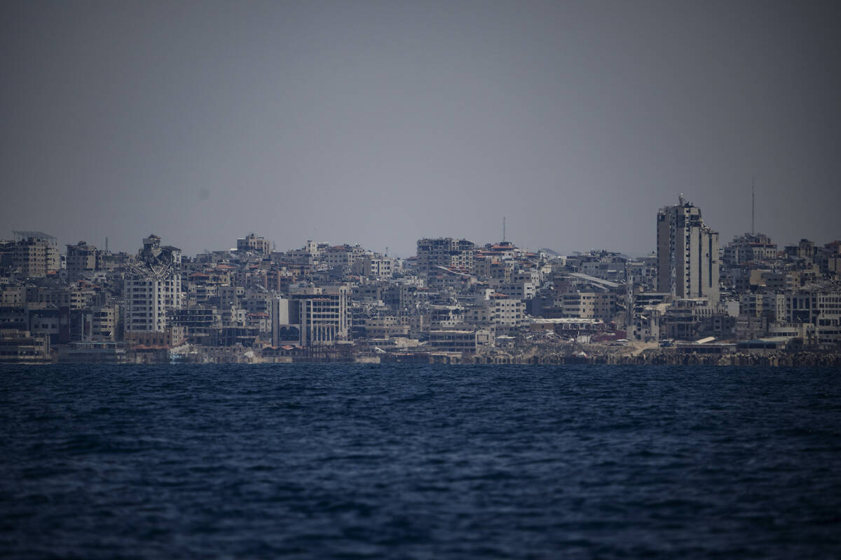 Destroyed buildings stand in the coast of the Gaza Strip as seen from the Mediterranean Sea, Tu ...