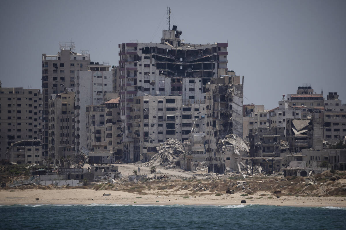 Destroyed buildings stand by the coast of the Gaza Strip as seen from the Mediterranean Sea, Tu ...