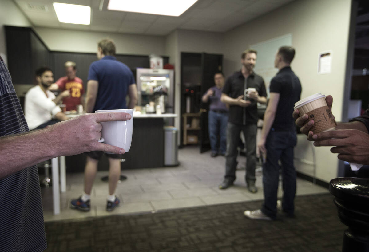 A group gathers for morning coffee at Work In Progress, 317 S. 6th Street, on Wednesday, Aug. 2 ...