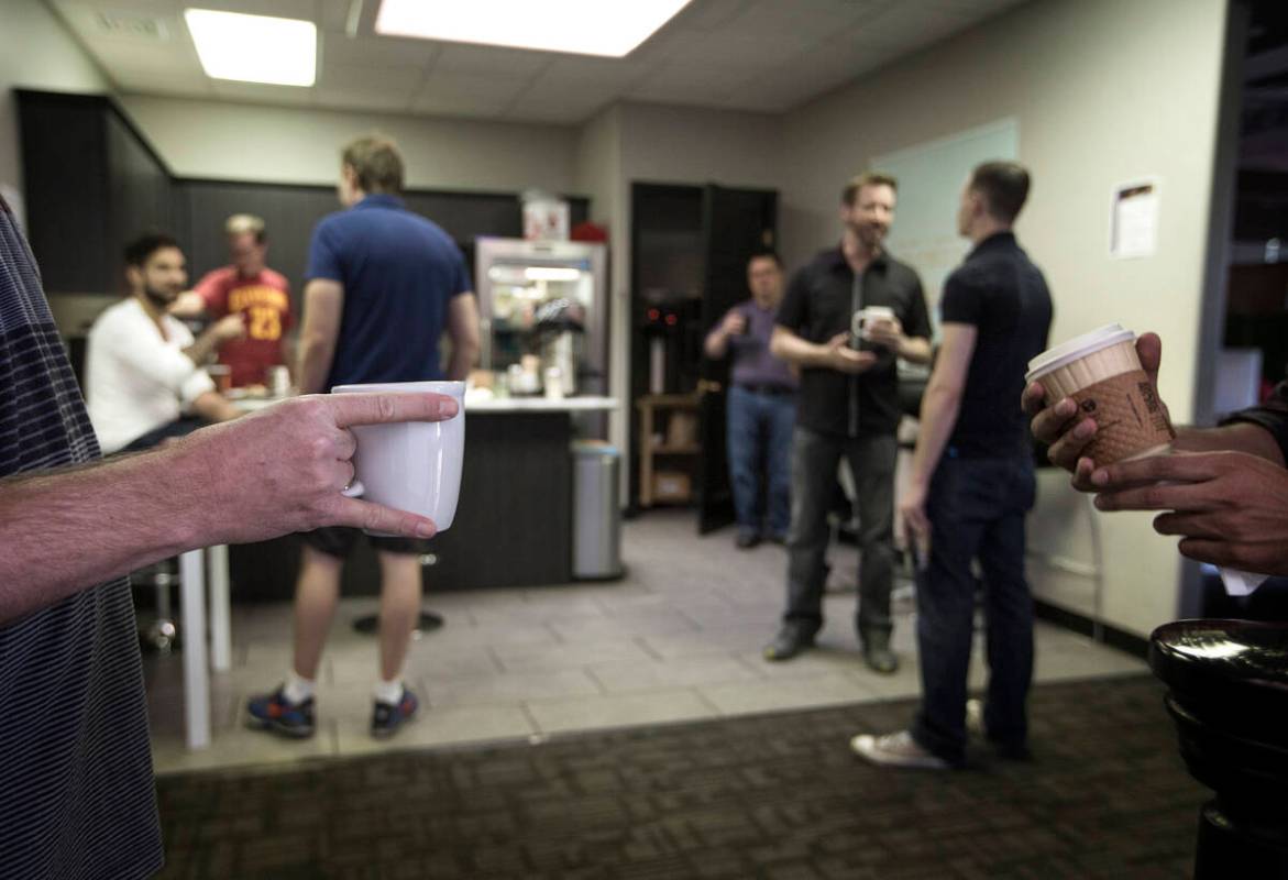 A group gathers for morning coffee at Work In Progress, 317 S. 6th Street, on Wednesday, Aug. 2 ...