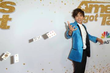 Illusionist Shin Lim throws his cards as he arrives at the "America's Got Talent" Season 13 Fin ...