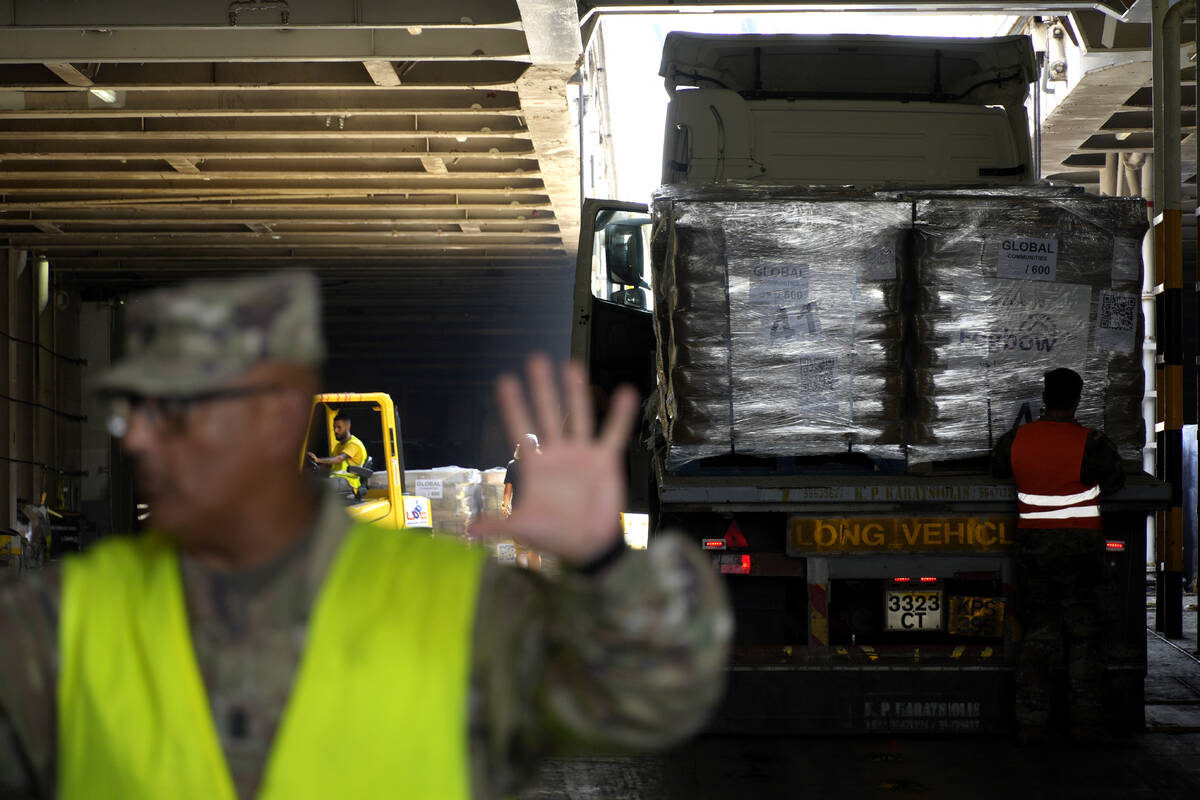 A truck carrying Gaza aid enter a U.S ship for unloading, at the port of Larnaca, Cyprus, Wedne ...