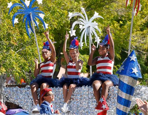 Children perform on the “Schoolhouse Rock!” float during the annual Summerlin Cou ...