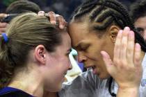 New York Liberty's Becky Hammon, left, and Teresa Weatherspoon celebrate after the Liberty beat ...