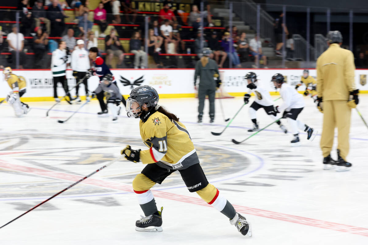 Young hockey players skate during the NHL Draft Prospect Youth Hockey Clinic at City National A ...