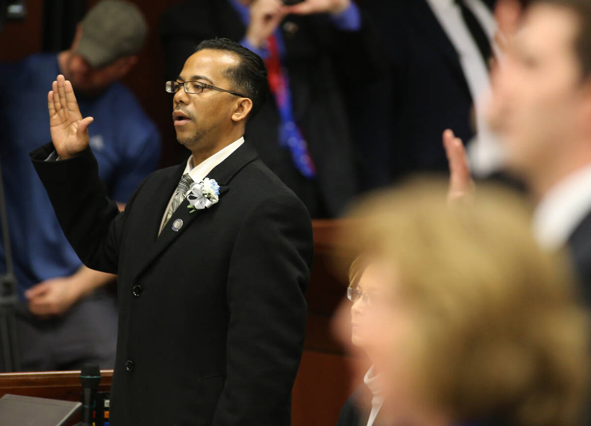 Embattled Nevada Assemblyman Steven Brooks, D-North Las Vegas, takes the oath of office during ...