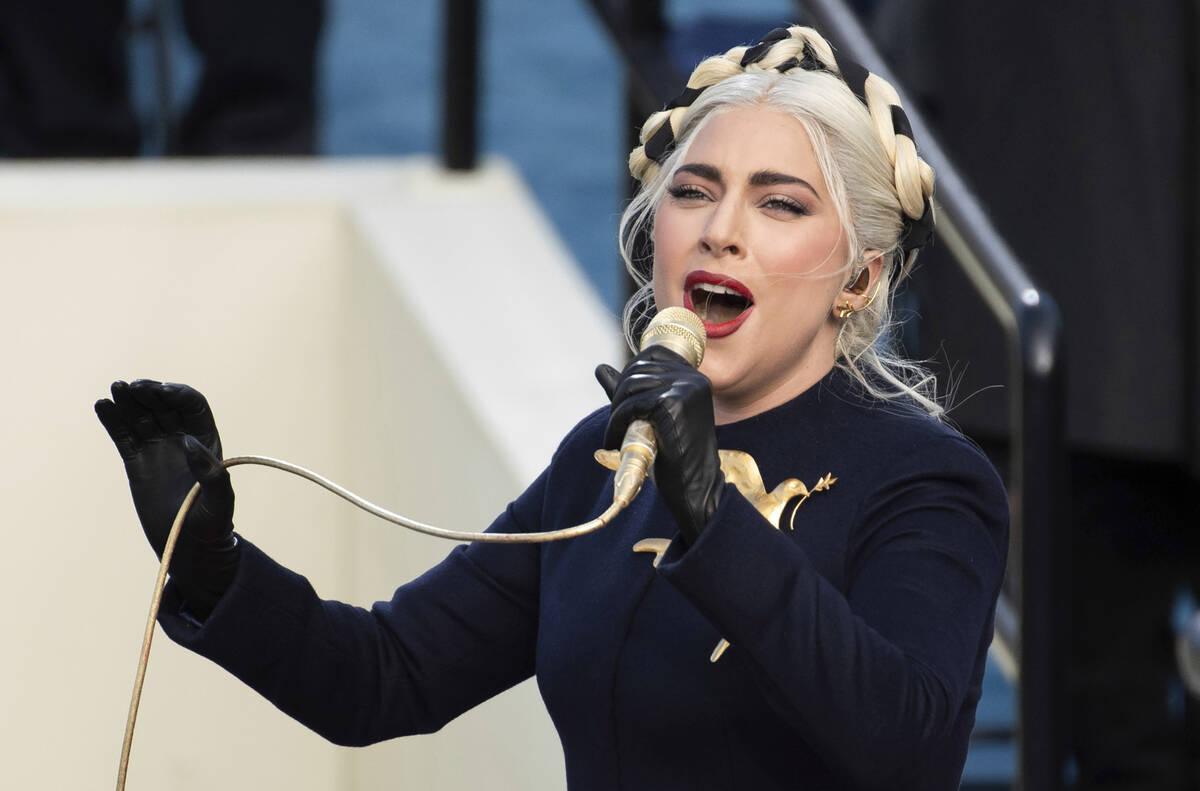 FILE - Lady Gaga sings the national anthem during President-elect Joe Biden's inauguration at t ...