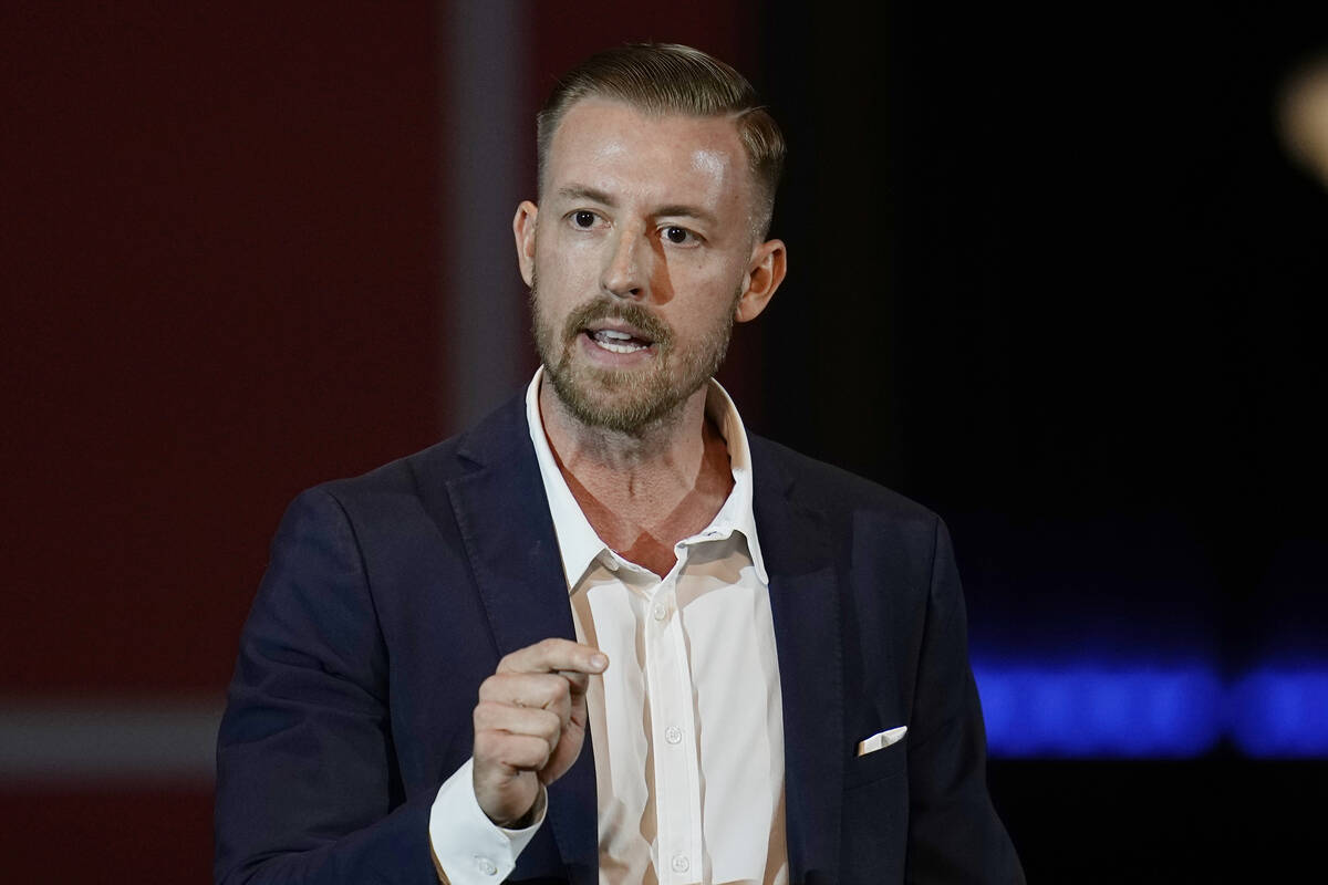 Ryan Walters, Republican candidate for Oklahoma State Superintendent, speaks at a rally, Nov. 1 ...