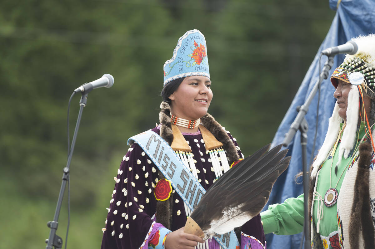Miss Shoshnone-Bannock Queen Develynn Hall takes the stage during a naming ceremony for a white ...