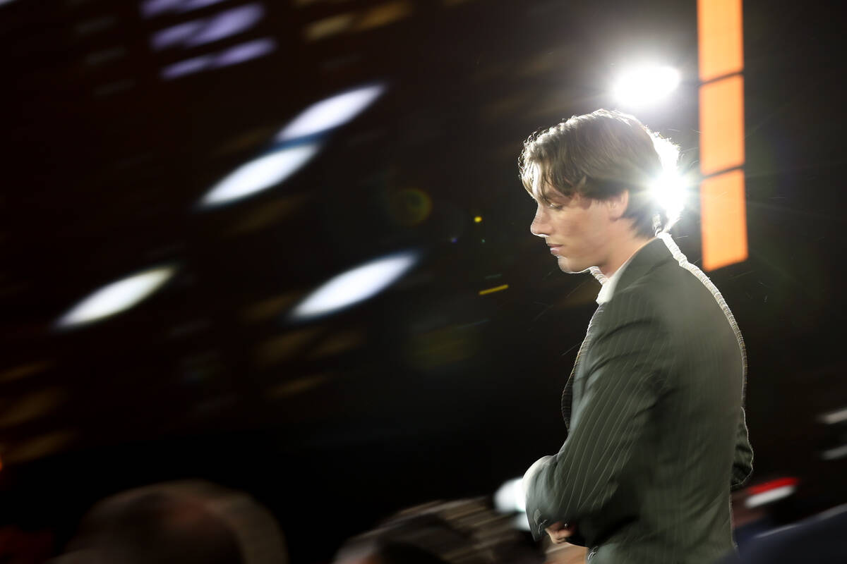 Forward Trevor Connelly walks to the stage after the Vegas Golden Knights selected him 19th ove ...