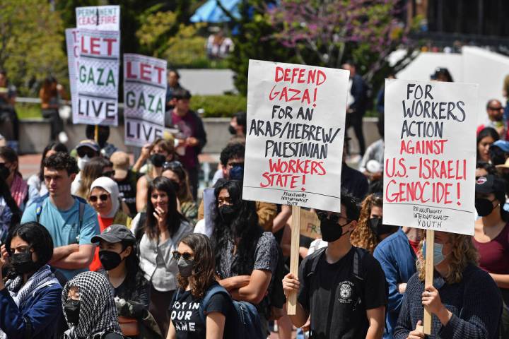 Pro-Palestinian protesters gather in front of Sproul Hall during a planned protest at Universit ...