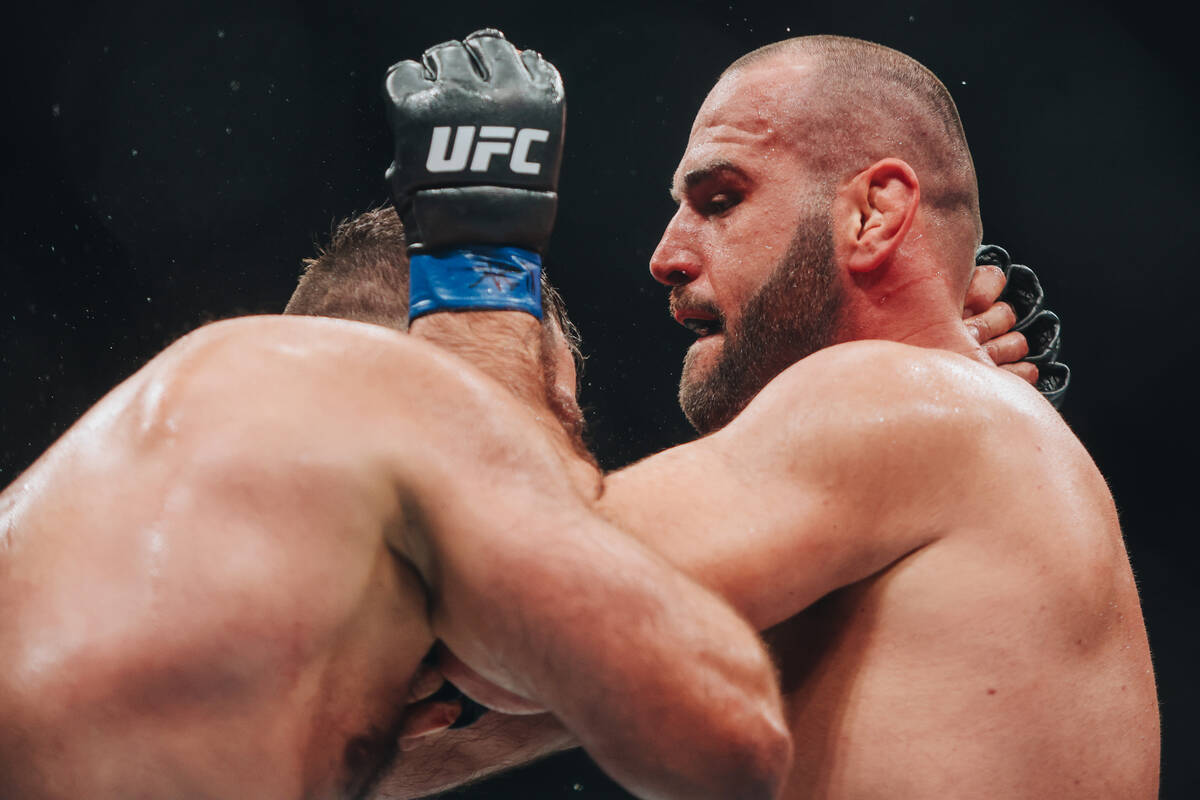 Martin Buday grabs Andrei Arlovski during their heavyweight bout at UFC 303 at T-Mobile Arena o ...