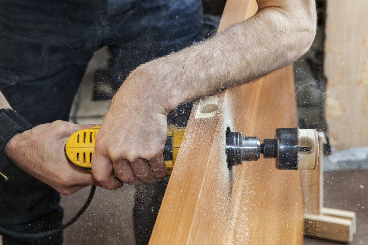 Installing a deadbolt requires drilling a couple of large holes house the lock. (Getty Images)