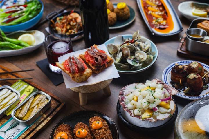 A variety of tapas from Chef Rafael Salines-Catalá at his Jamón Jamón Wood Fired Kitchen in ...