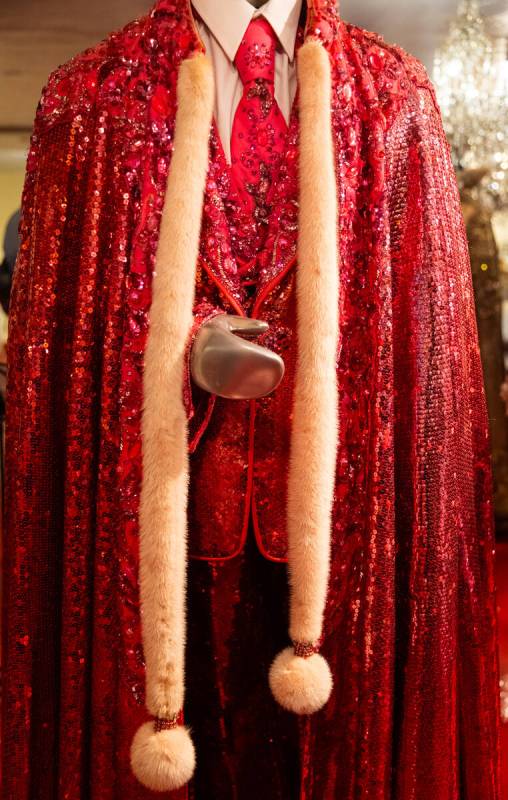 A pink sequined suit and cape are seen during a tour of the Liberace Museum Collection at Thril ...