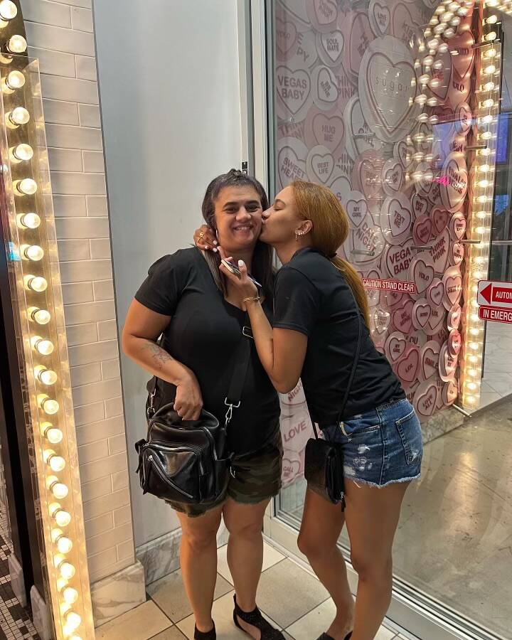 Jeannette Faria kisses her mother, Sherlyn Faria. (Courtesy)
