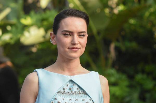 Daisy Ridley arrives at the premiere of "Young Woman and and the Sea" on Thursday, Ma ...
