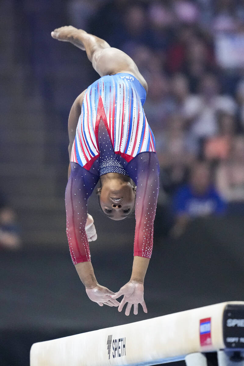 Simone Biles competes on the balance beam at the United States Gymnastics Olympic Trials on Sun ...