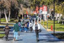 People make their way across campus as students return for classes on Tuesday, Jan. 16, 2024, i ...