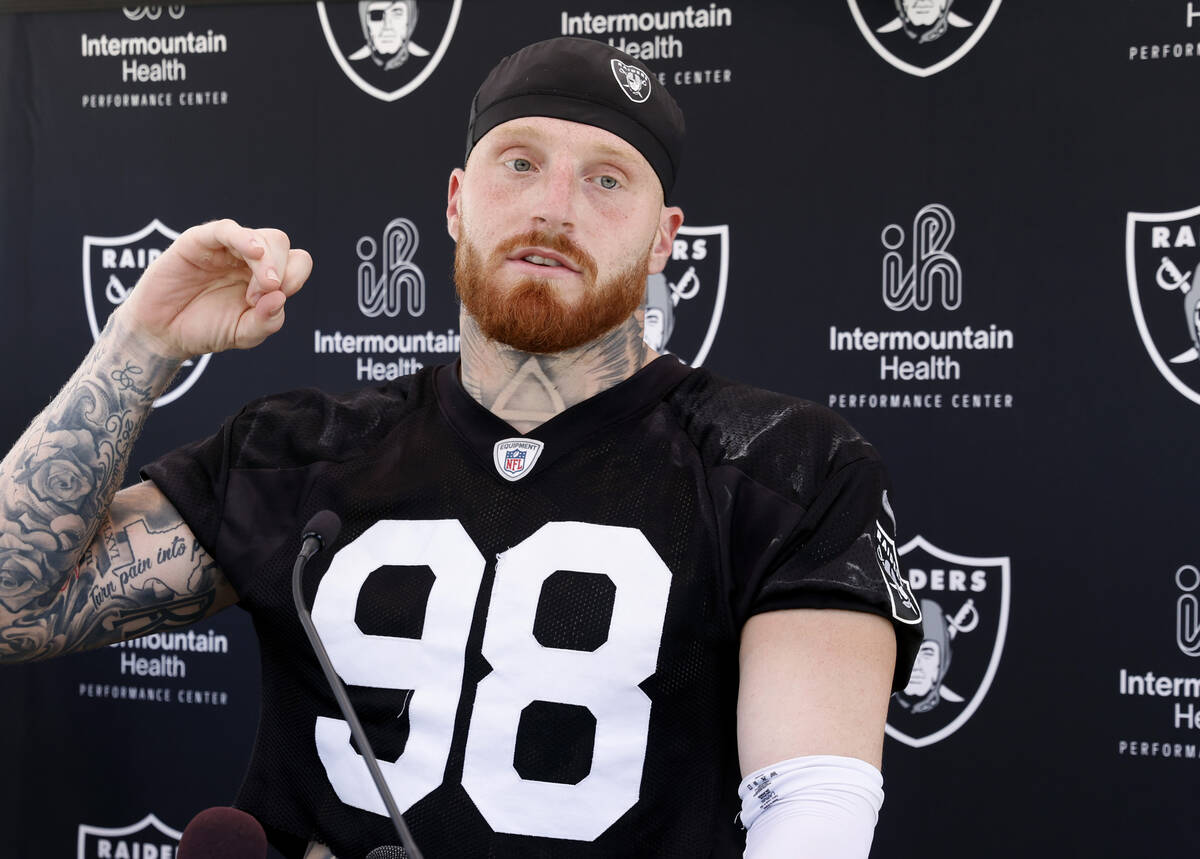Raiders defensive end Maxx Crosby (98) addresses the media after an NFL football practice at th ...