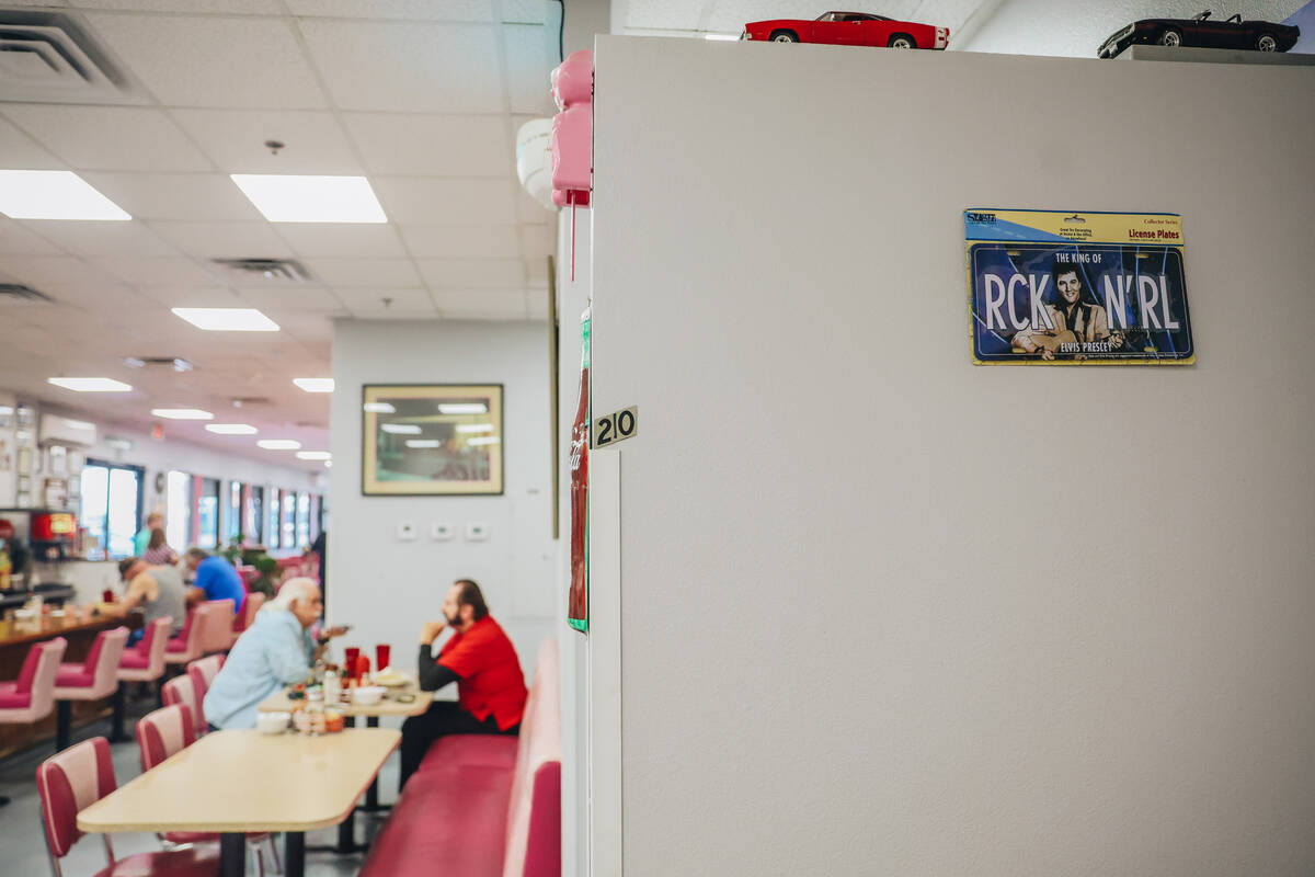 An Elvis license plate is seen inside of Vickie’s Diner, which is located inside of the ...