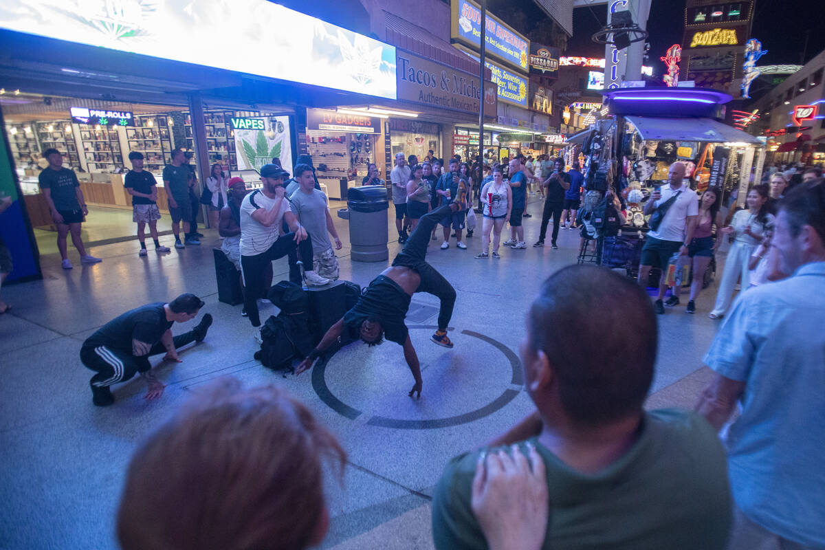 A group of buskers perform at the Fremont Street Experience Monday, July 1, 2024, in Las Vegas. ...