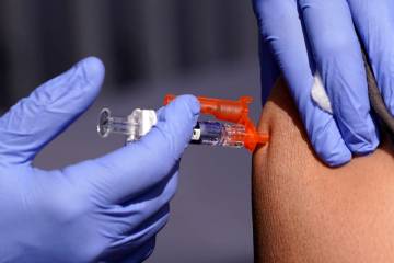 A patient is given a flu vaccine Oct. 28, 2022, in Lynwood, Calif. On Tuesday, July 2, 2024, th ...