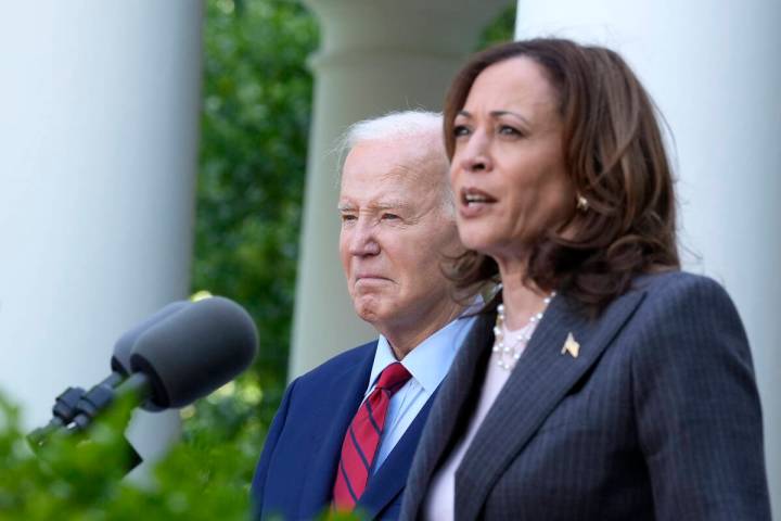 Vice President Kamala Harris speaks as President Joe Biden listens in the Rose Garden of the Wh ...