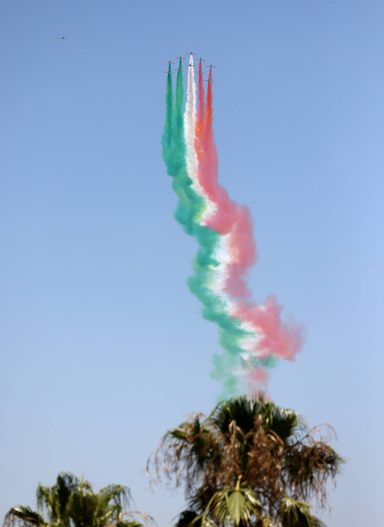 The Italian Air Force’s aerial demonstration team, Aeronautica Militare, flies over the ...
