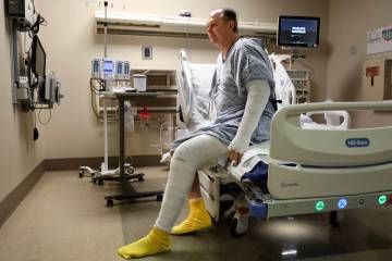 Stephen Cantwell sits on his bed at the UMC Lions Burn Care Center as he recovers from severe b ...