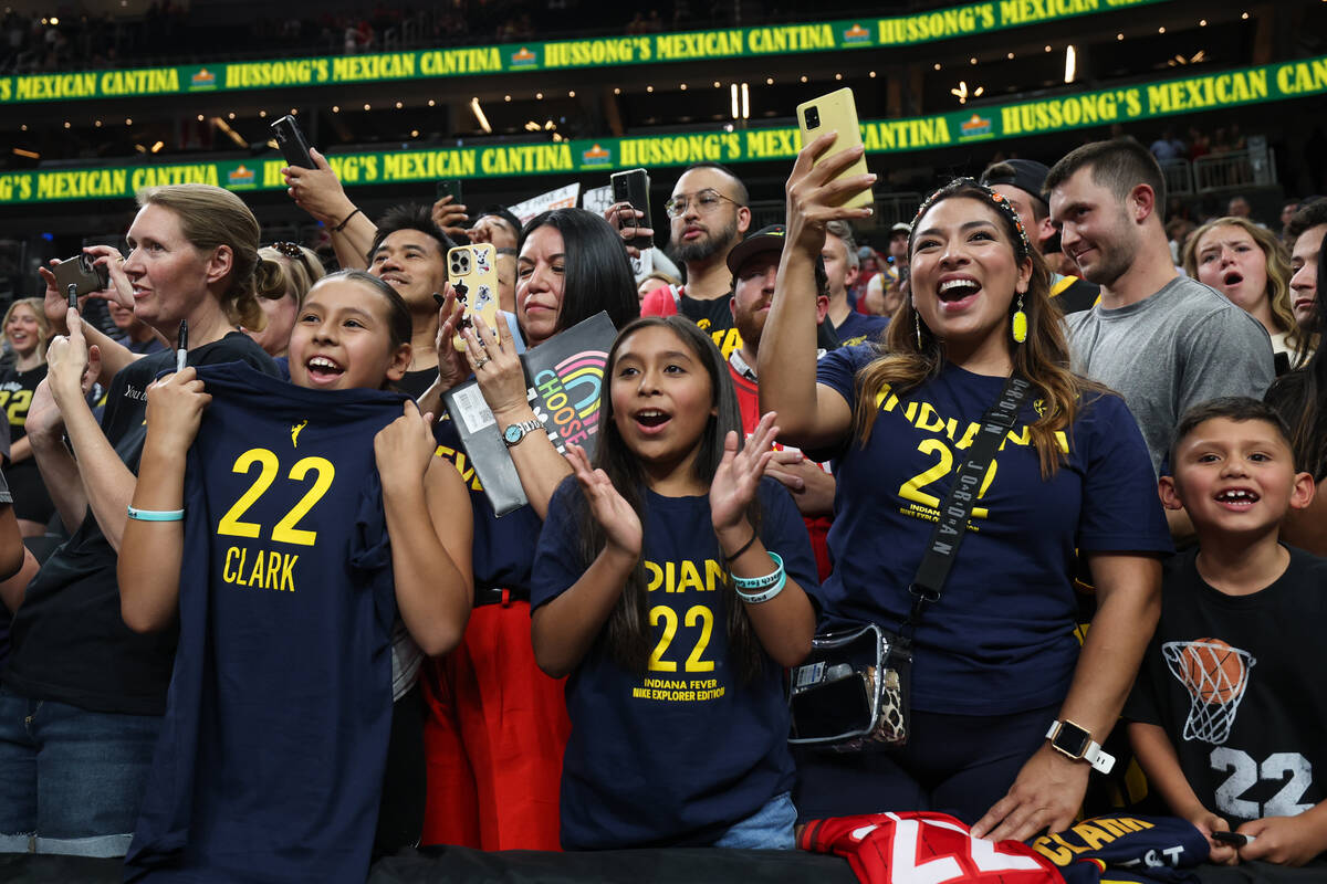Indiana Fever guard Caitlin Clark fans cheer while the Fever warm up before a WNBA basketball g ...