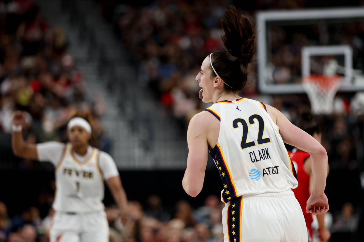 Indiana Fever guard Caitlin Clark (22) celebrates after scoring during the second half of a WNB ...