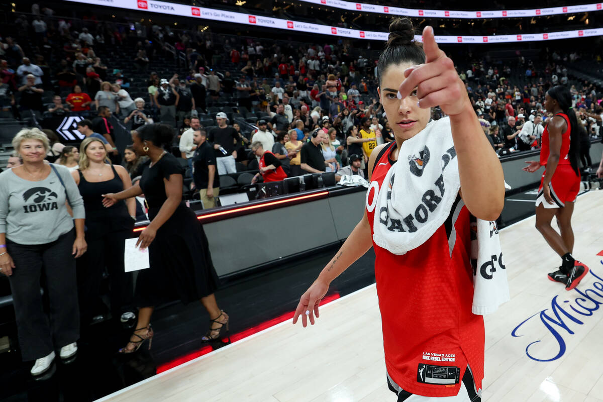 Las Vegas Aces guard Kelsey Plum gestures to the crowd after winning a WNBA basketball game aga ...