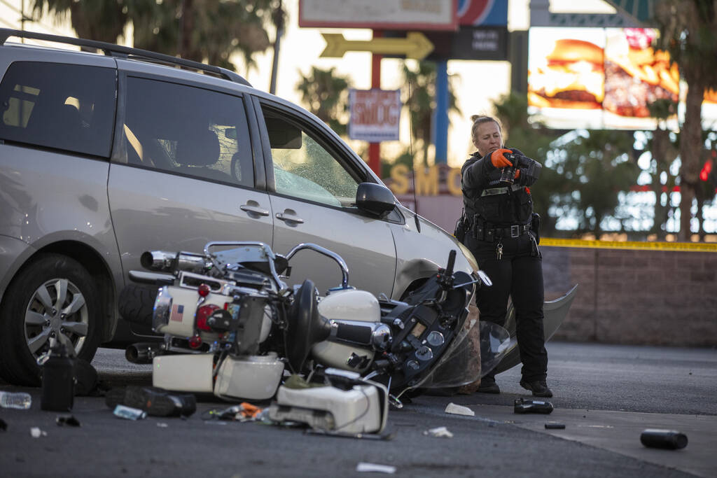 Crews from the Metropolitan Police Department investigate a crash scene at the 7-Eleven on Sout ...
