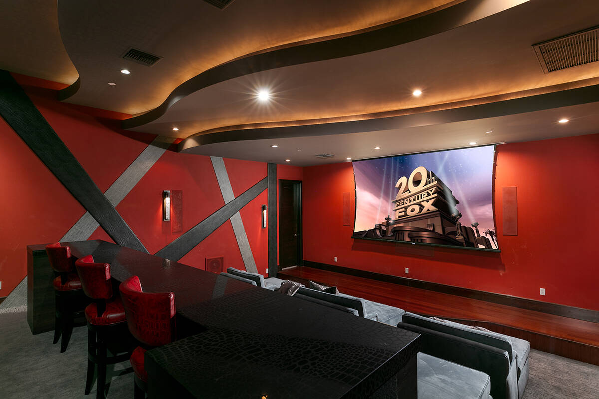 The MacDonald Highlands mansion is built for entertaining and features a home theater. (IS Luxury)