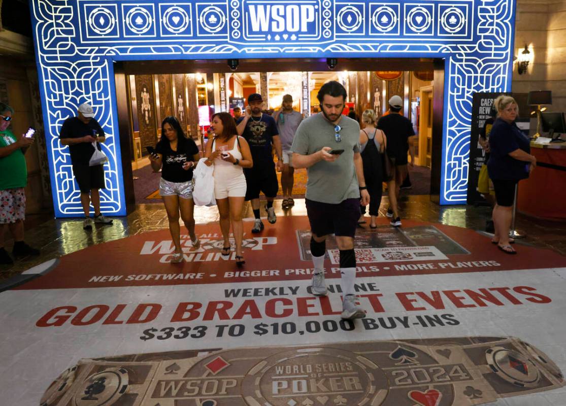 People arrive at Horseshoe hotel-casino during the first day of the World Series of Poker Main ...