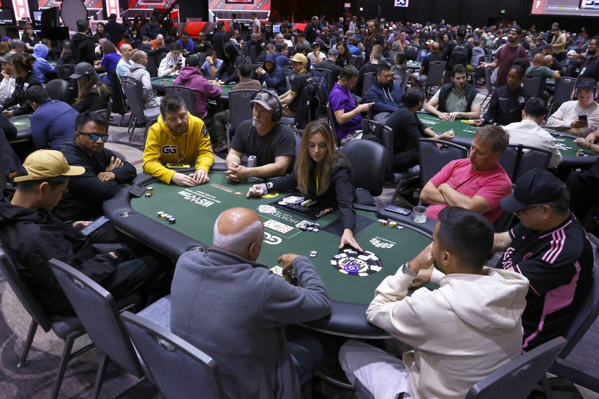 People participate during the first day of the World Series of Poker Main Event at Horseshoe ho ...