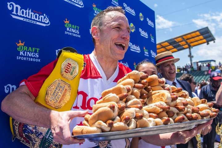 FILE - Joey Chestnut, winner of the 2021 Nathan's Famous Fourth of July International Hot Dog-E ...