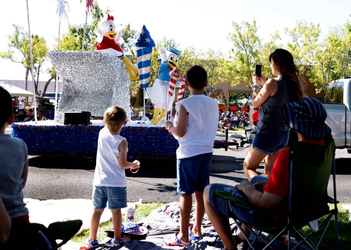 People watch the annual Summerlin Council Patriotic Parade, on Thursday, July 4, 2024, in Las V ...