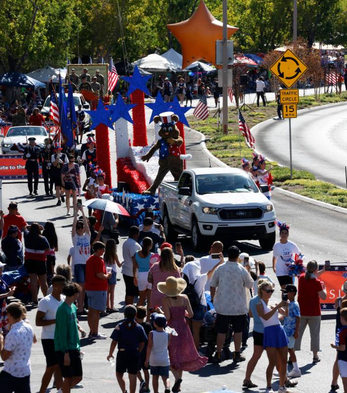 People watch the annual Summerlin Council Patriotic Parade, on Thursday, July 4, 2024, in Las V ...