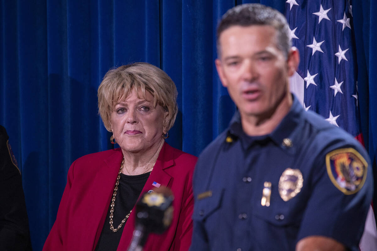 Las Vegas Mayor Carolyn Goodman, left, watches Clark County Fire Department Deputy Chief Thomas ...