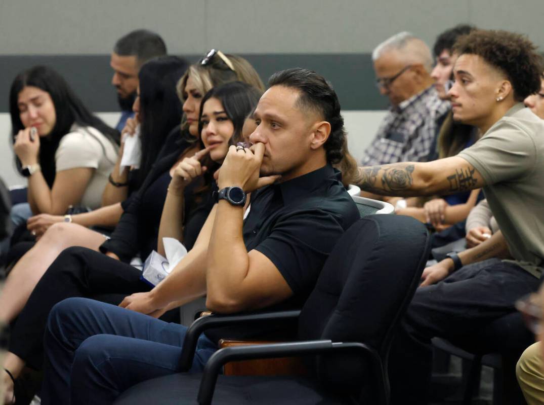 Alberto Sarabia, front, and Anabel Sarabia, parents of Angelina “Angie” Erives, a ...