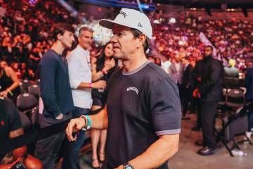 Actor Mark Wahlberg greets other attendees at UFC 303 at T-Mobile Arena on Saturday, June 29, 2 ...