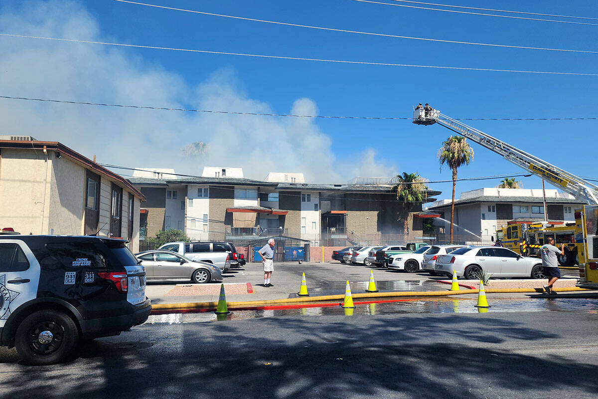 The Clark County Fire Department works to extinguish a fire at 1000 Dumont Road on Wednesday, J ...