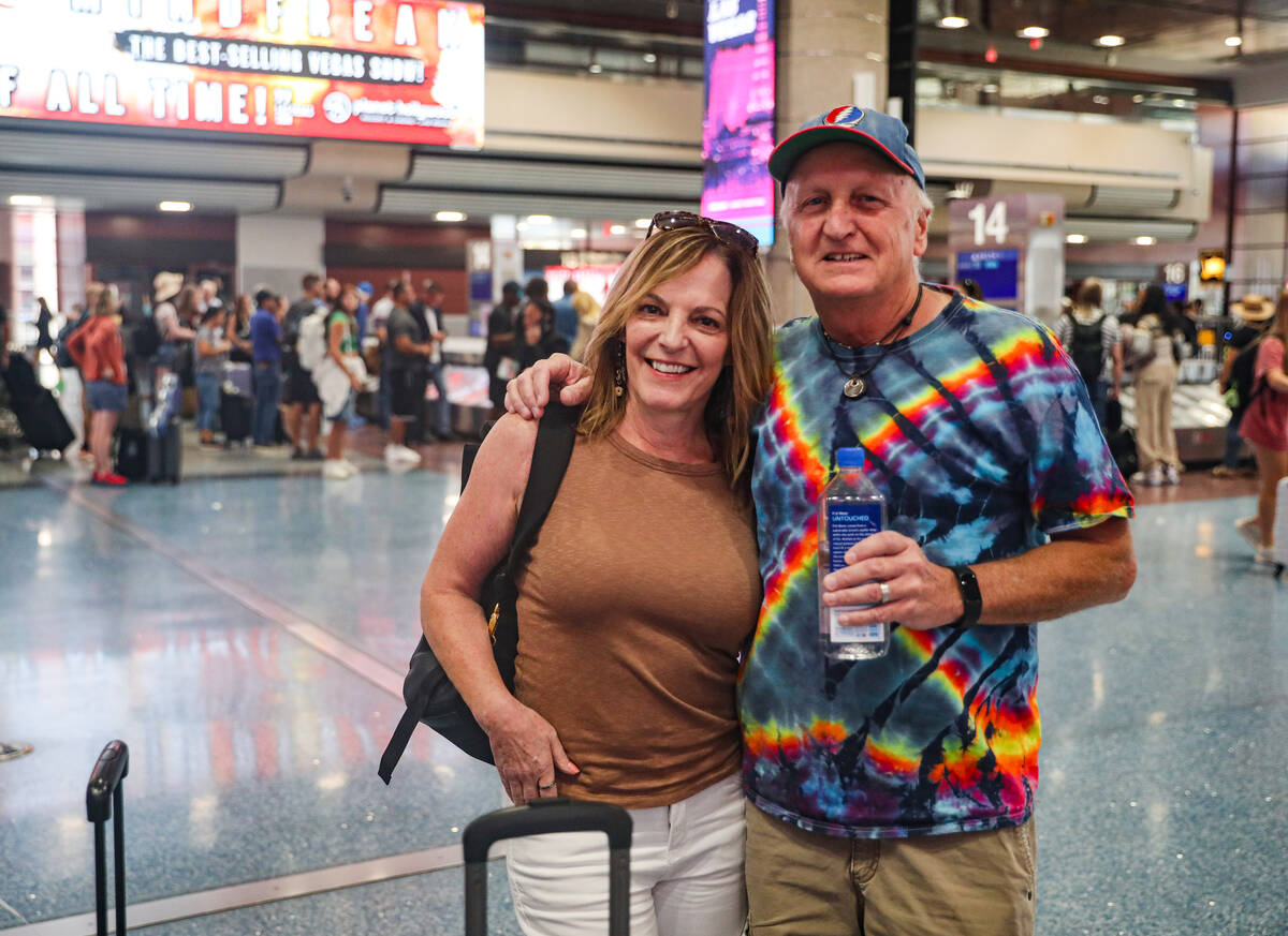 Beth Zegarac, left, and her husband Mike Zegarac, right, both of Ohio, pose for a portrait in t ...