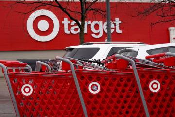 Shopping carts are lined up outside of a Target store on Nov. 16, 2022, in Chicago. (Scott Olso ...