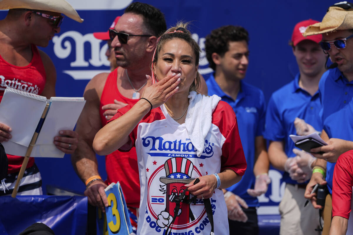 Miki Sudo reacts after winning the women's of the Nathan's Famous Fourth of July hot dog eating ...