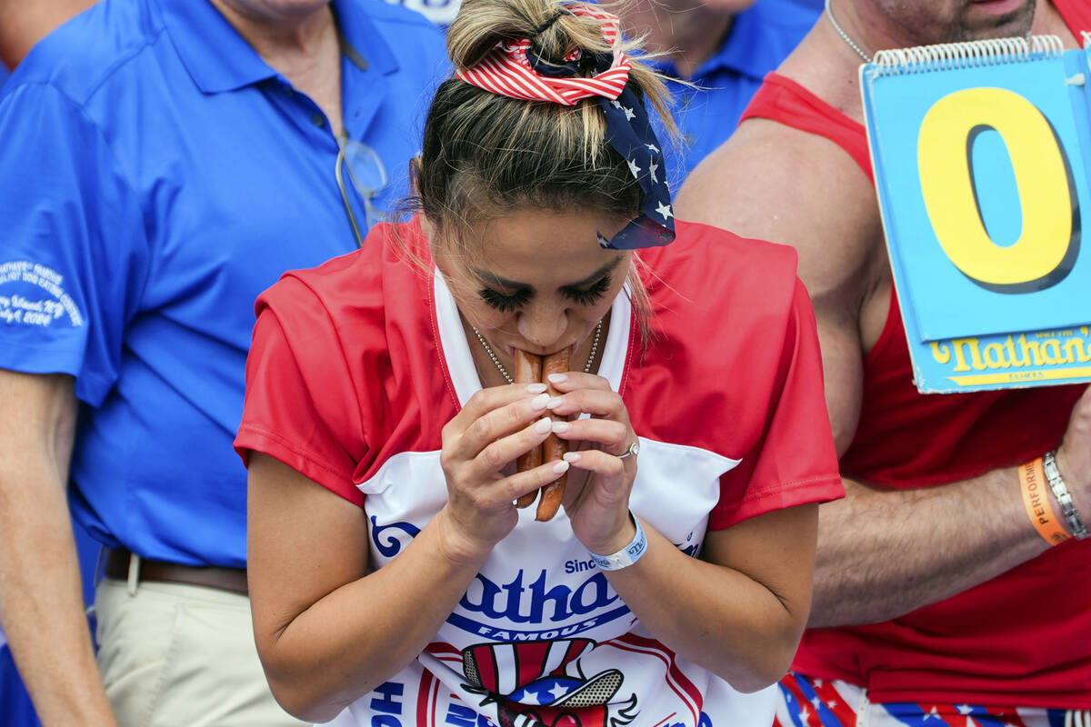 Miki Sudo competes in the Nathan's Famous Fourth of July hot dog eating contest, Thursday, July ...