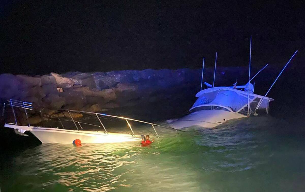 This photo shows a power boat that crashed into a jetty in Southern California on Wednesday, Ju ...